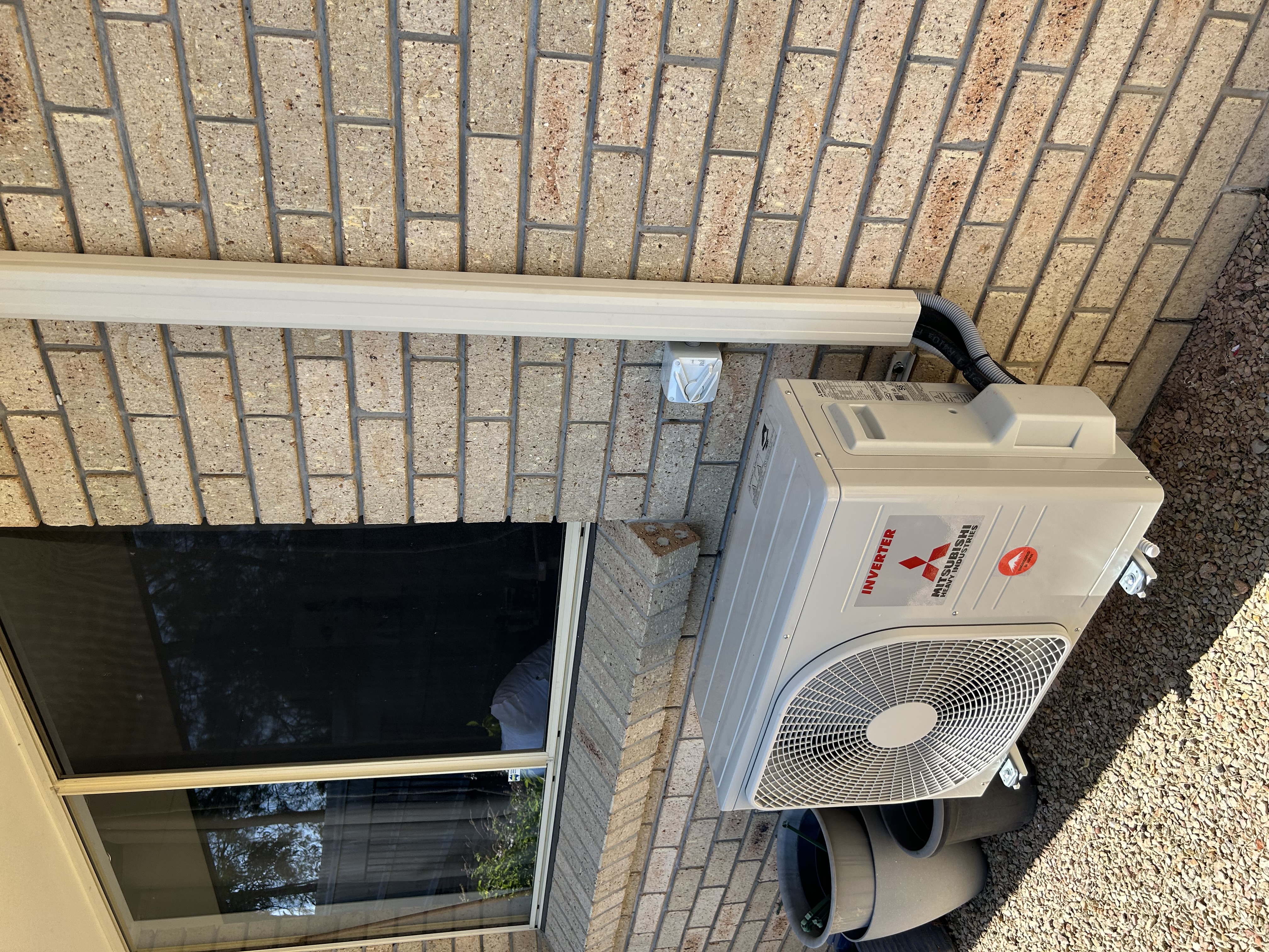 MHI outdoor unit installed by Home Comfort Air in Ormeau Hills